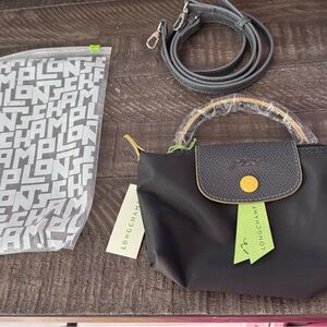 Longchamp Black Mini Bag with Gold Accents